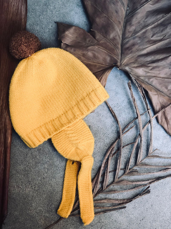 Gorro tejido con pompon