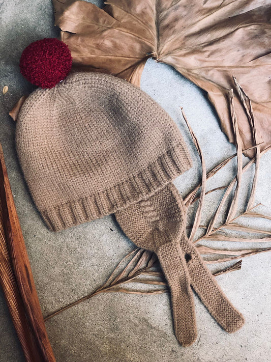 Gorro tejido con pompon
